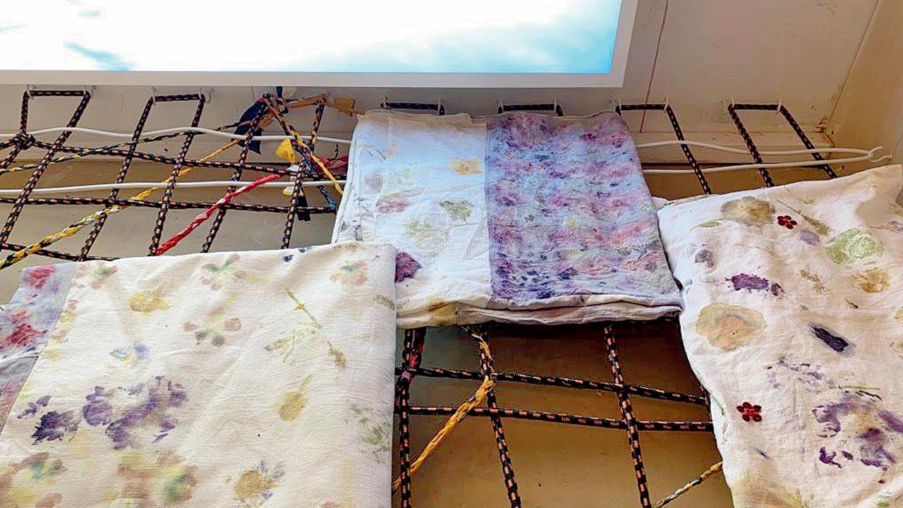 Bedding for the house has been designed by Chandola, inspired from the Indian charpoy. Material from a used parachute of an astronaut has been weaved together to make the charpoy bed. Mustard seeds are stuffed inside the pillow, generally used for newborns in India to help maintain their head-shape. The fabric is naturally dyed with flowers and food waste generated by the house 