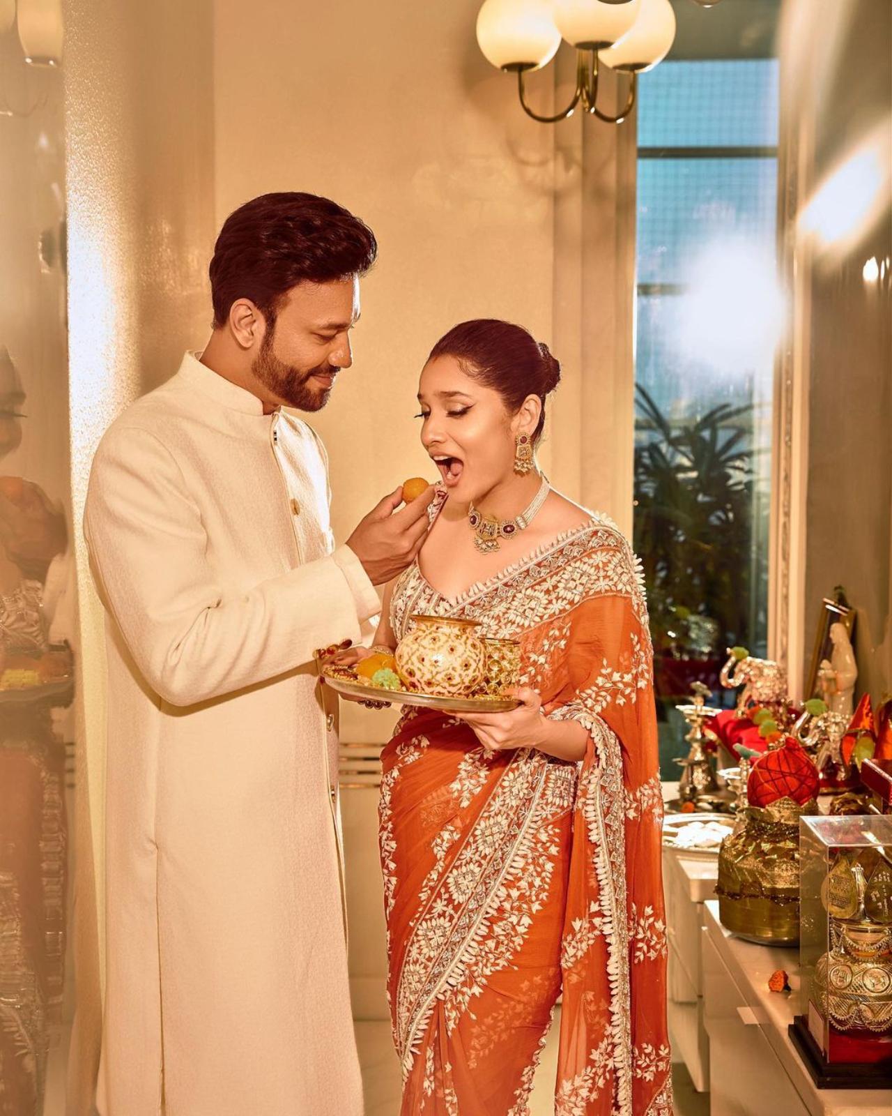 Just like their wedding, Ankit and Vicky had a grand celebration to bring in their first Karwa Chauth. Ankita looked gorgeous in an embroidered red saree, while Vicky opted for a white sherwani