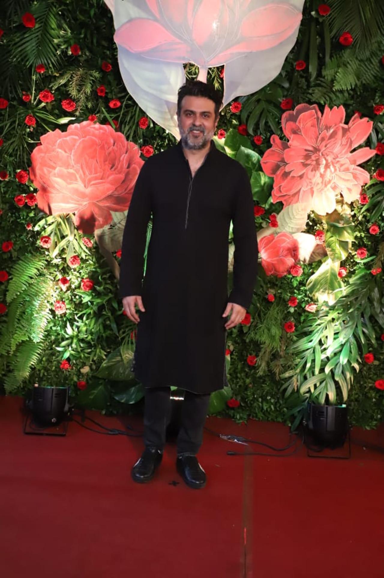 Actor/producer Harman Baweja made a solo entry at the party in a black kurta. Sporting a salt and pepper look, Baweja was all smiles for the paparazzi