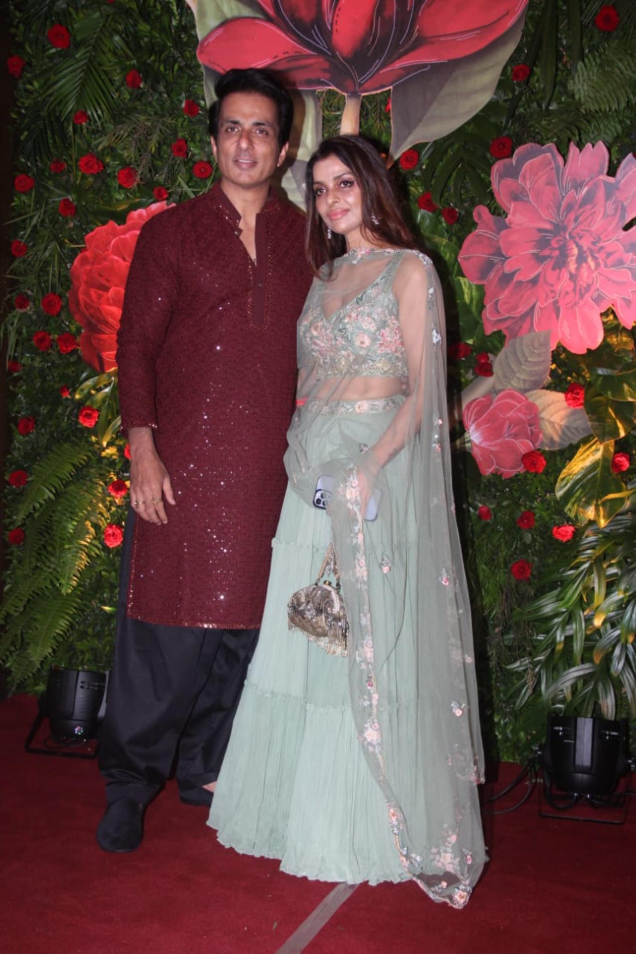 Sonu Sood looked smart in a red shimmery kurta pajama. He was accompanied by his wife