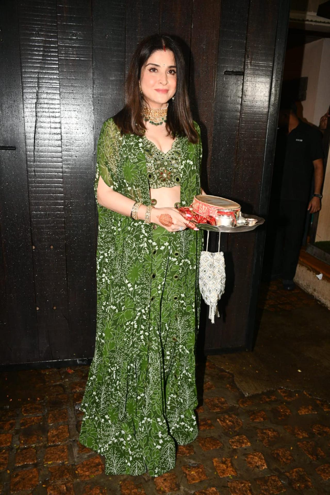 Maheep Kapoor, who is Sunita Kapoor's sister-in-law arrived in a green lehenga for the celebration