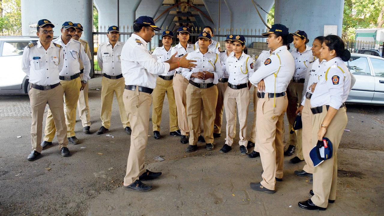  Cops work on their plan for Wednesday when two big rallies will be held. Pic/Ashish Raje