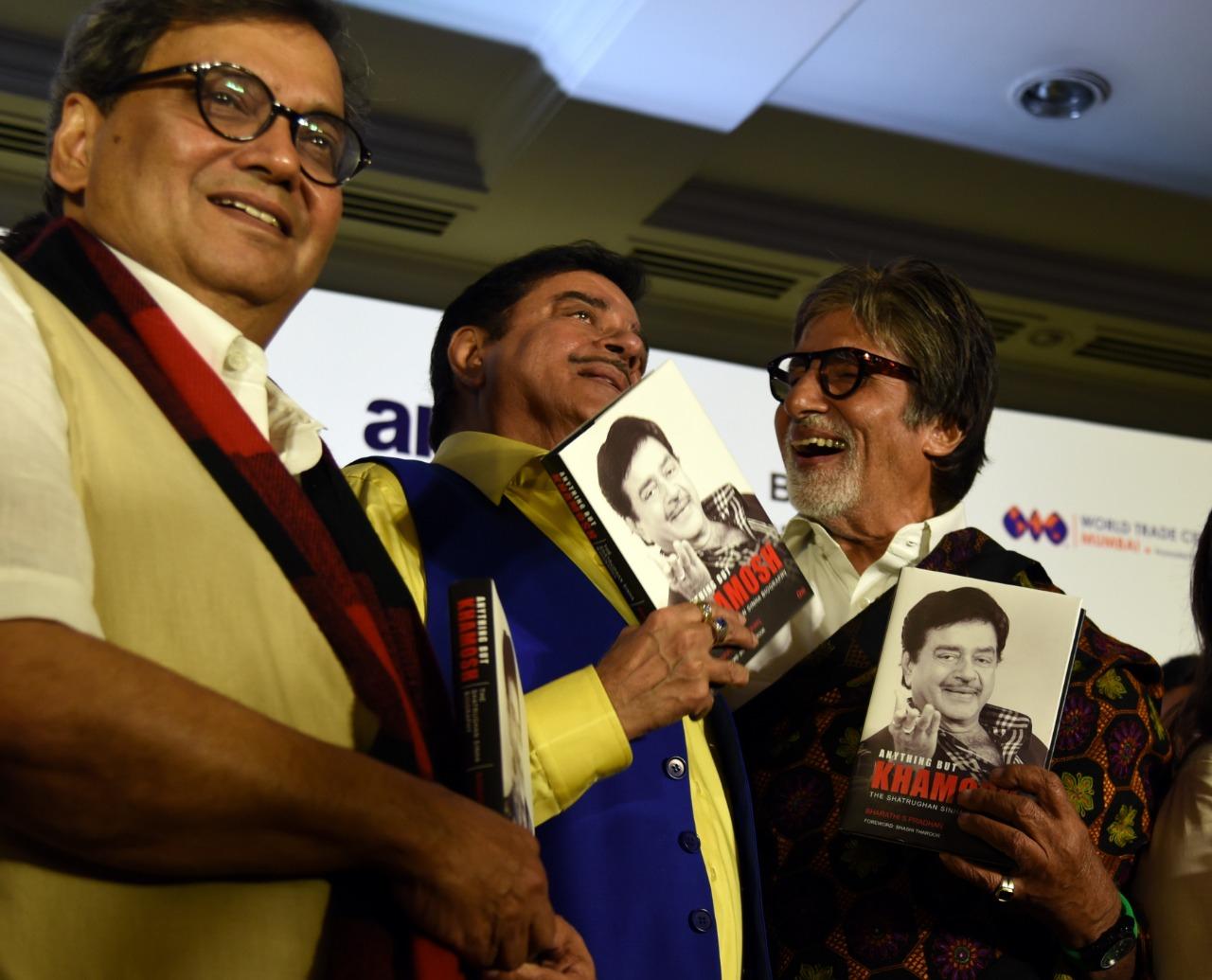 At the book launch of Shatrughan Sinha's autobiography, Amitabh Bachchan shares a light-hearted moment with the actor on stage. Seen in the frame is also director Subhash Ghai