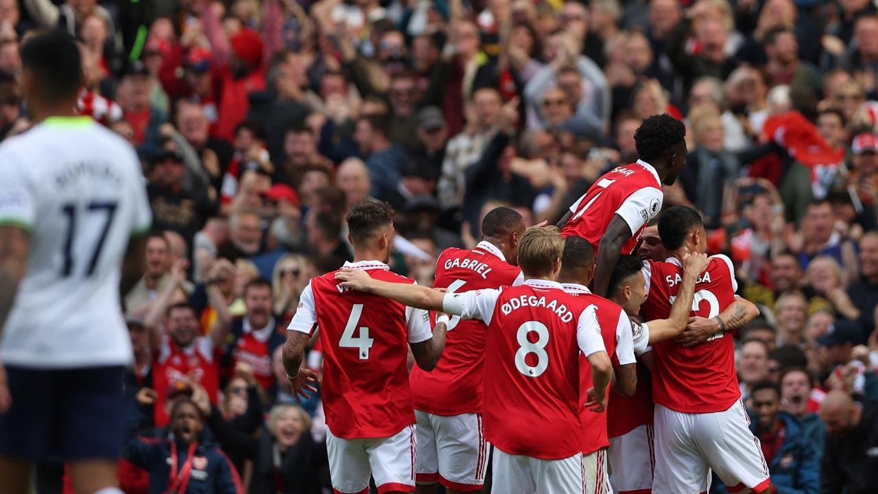 Arsenal sink 10-man Tottenham 3-1