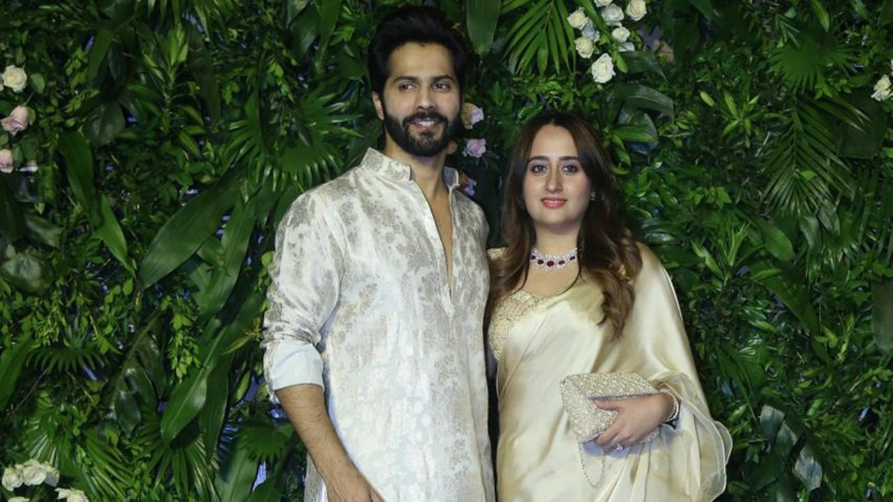 Varun Dhawan and wife Natasha showed up colour co-ordinated in white. They made for a stunning couple.
