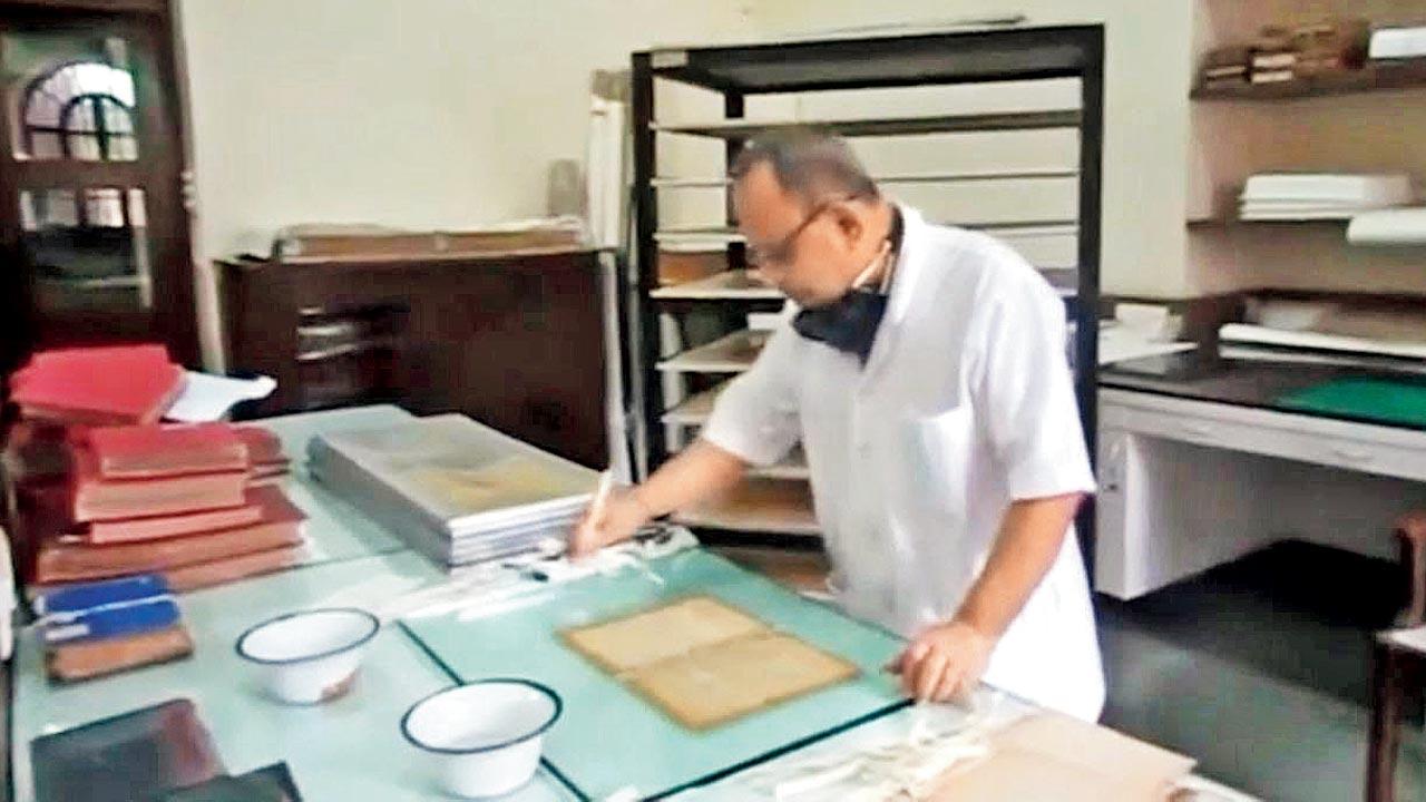 Conservation of old books in process. Pic courtesy/Youtube