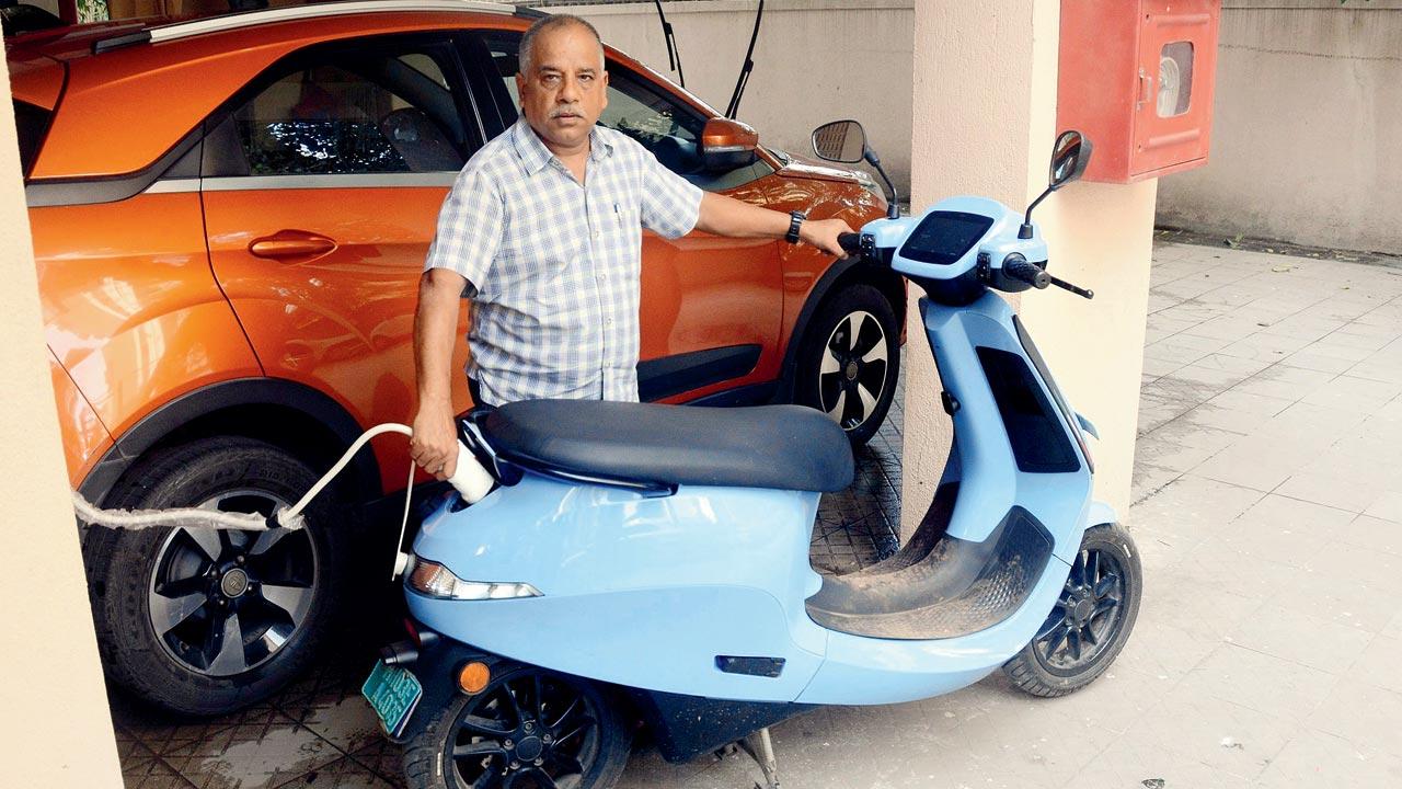 Rajendra Awasthi bought his Ola E-scooter in August this year because he felt it was a known brand. The EV scooter has an indicator, which a lot of companies have now started to install after seeing an increase in EV fires.  Pic/Sayyed Sameer Abedi