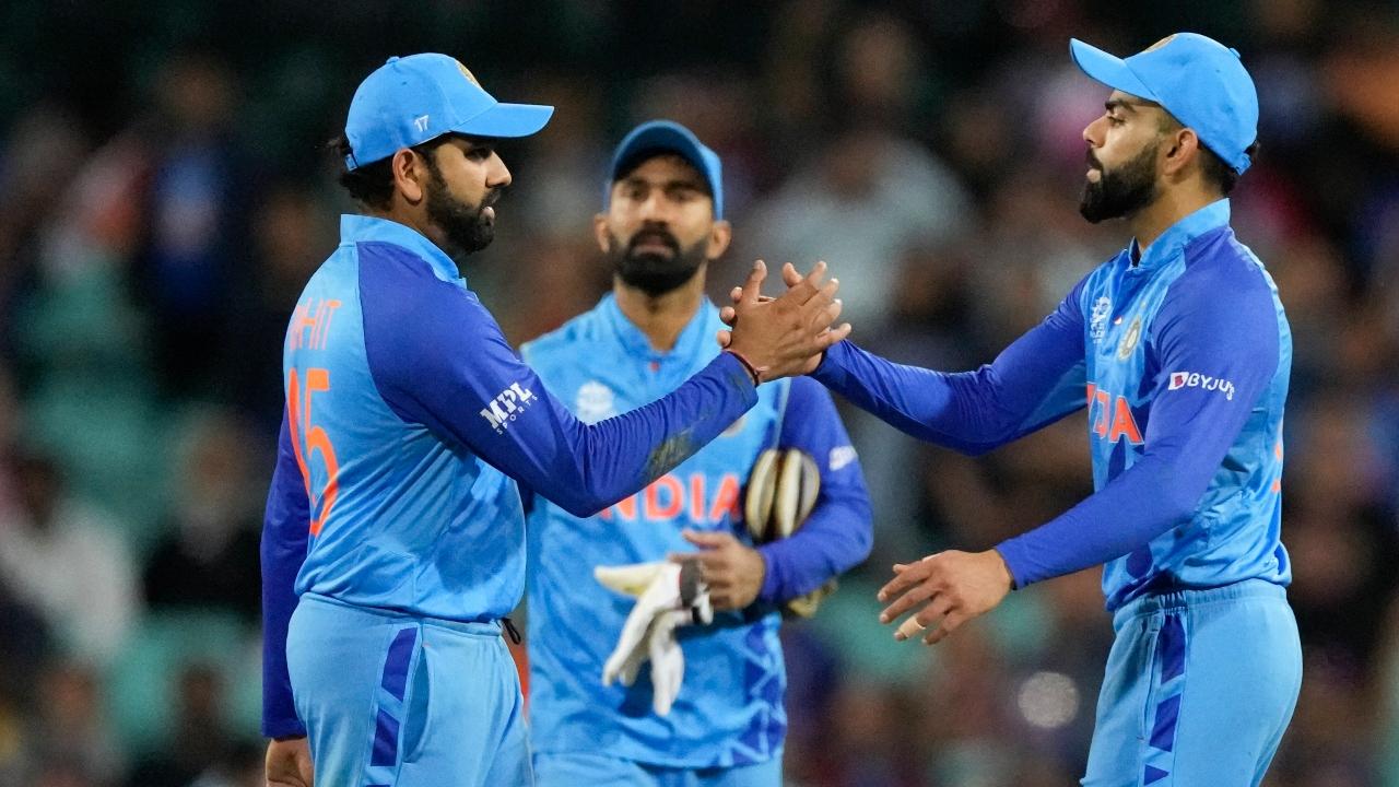 India's Rohit Sharma, left, and Virat Kohli shake hands after the T20 World Cup cricket match between India and the Netherlands in Sydney, Australia