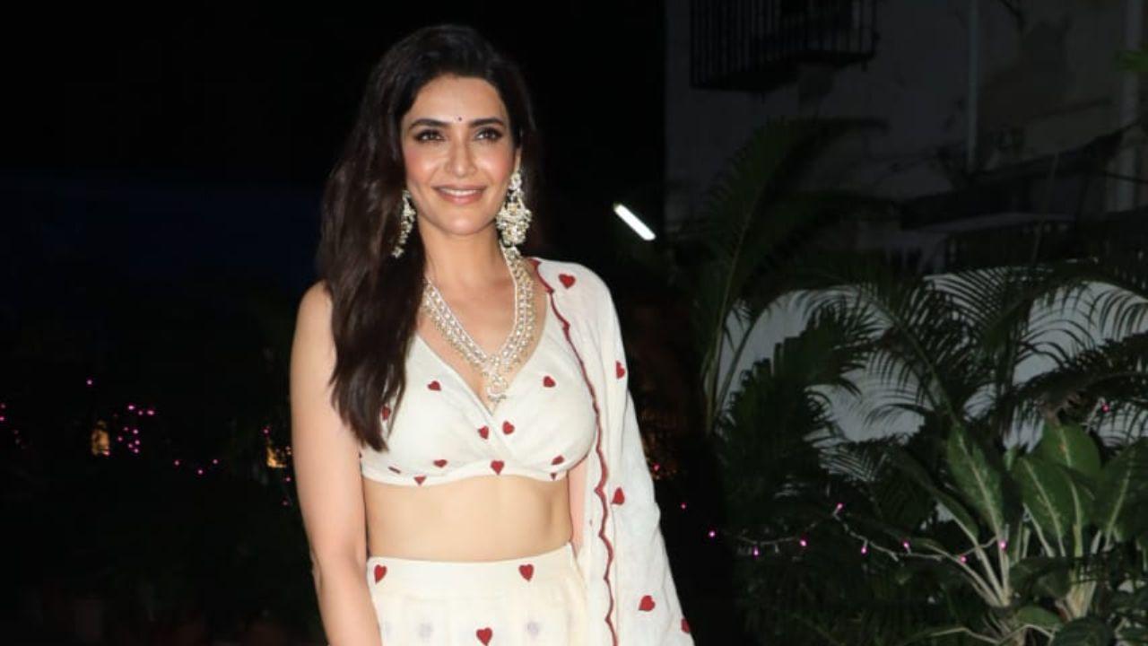 The television world’s star Karishma Tanna, who had got married earlier this year, hosted a Diwali party, which was attended by many celebs. Despite black being the colour of the night, the party’s host Karishma defied all the odds as she shone bright in her white dress with hearts all over! 
(Pics: Yogen Shah) 