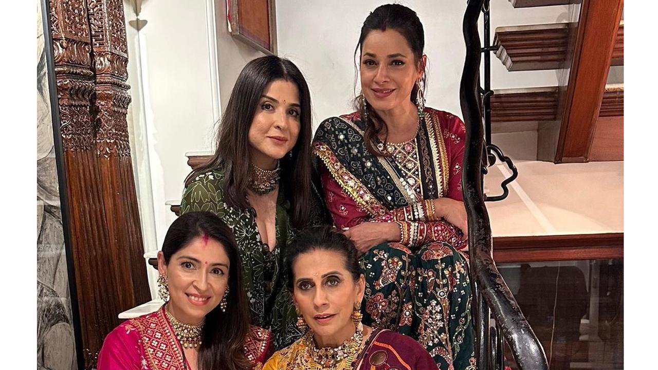 The 'fabulous' wives pose with host Sunita Kapoor. The ladies define elegance in this picture.