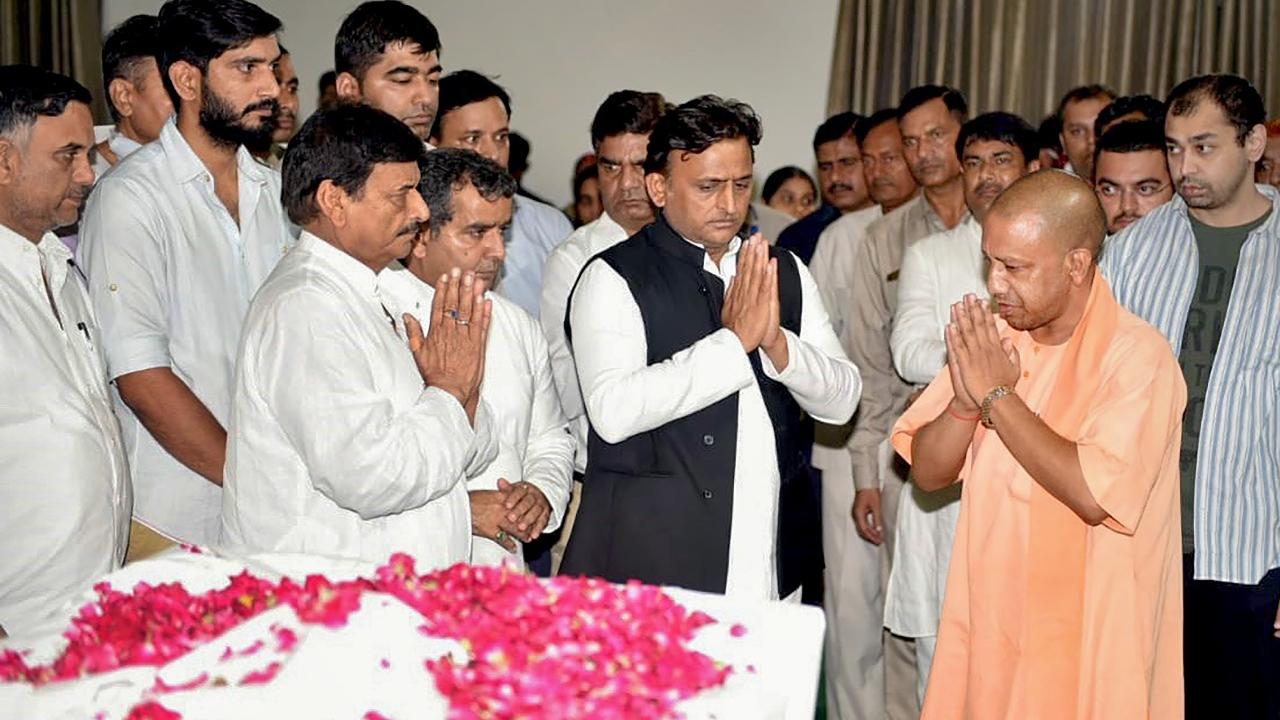 Uttar Pradesh Chief Minister Yogi Adityanath pays his last respects to the mortal remains of Samajwadi Party founder Mulayam Singh Yadav
