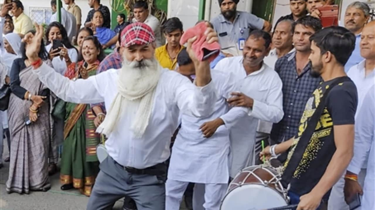 Supporters celebrate Kharge's win. He would be the first non-Gandhi president in 24 years Pic/PTI