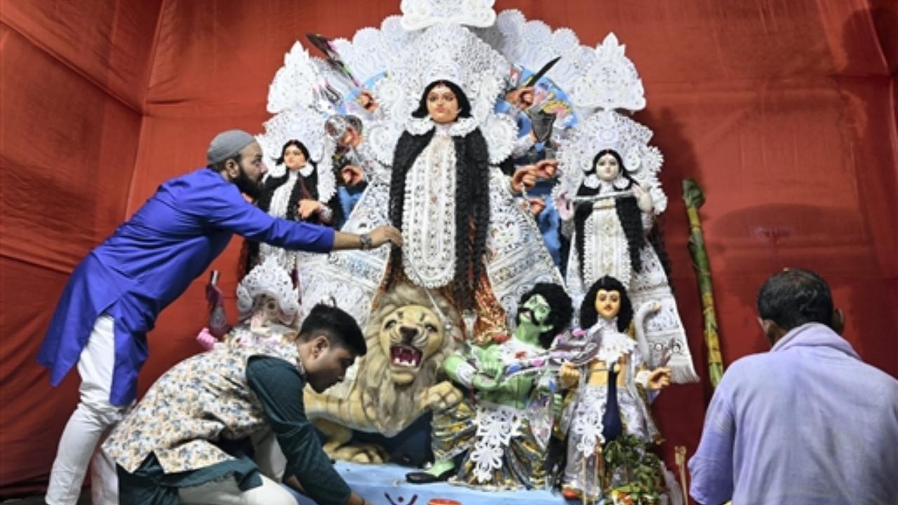 In Photo: Devotees celebrate Durga Puja across India