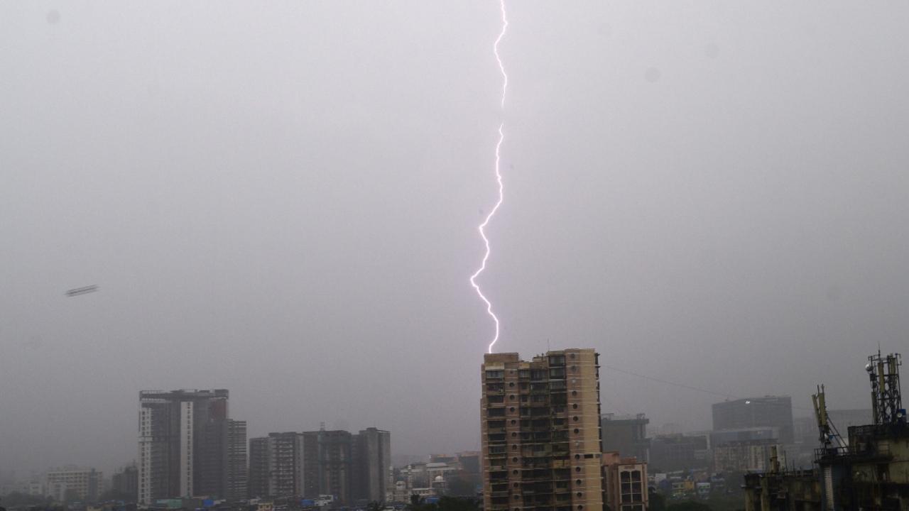 IN PHOTOS: Heavy rains, lightning strike Mumbai