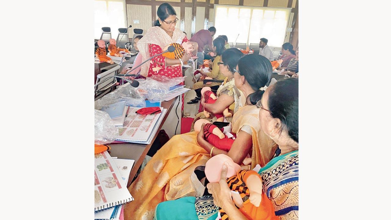 Dr Rupal Dalal coaches pregnant women and healthcare workers in Nandurbar on the right way to breastfeed and tackle malnutrition