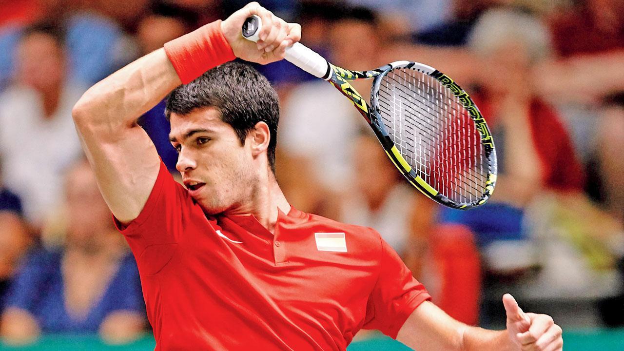 No.1 Alcaraz puts Spain into quarter-finals