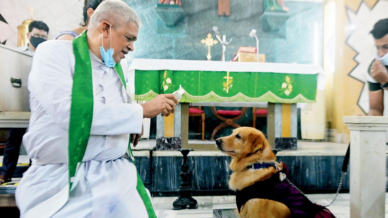 Fr Joseph D’Souza during a blessing held last year at St John the Evangelist Church, Ballard Estate