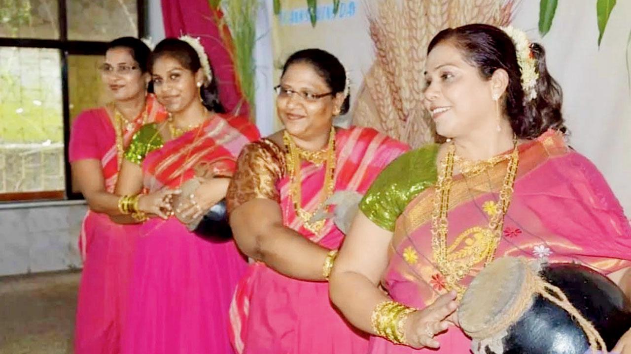 Women in the East Indian traditional attire, lugra, at a previous edition of the fest