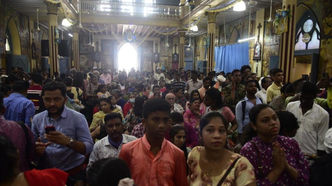 Thousands of devotees visit Mount Mary Church during the Bandra fair. Devotees offer prayers and also light candles.