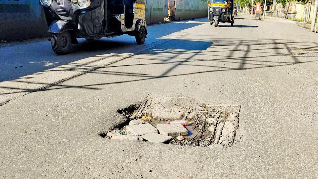 A damaged stormwater drain grill cover spotted in Vile Parle