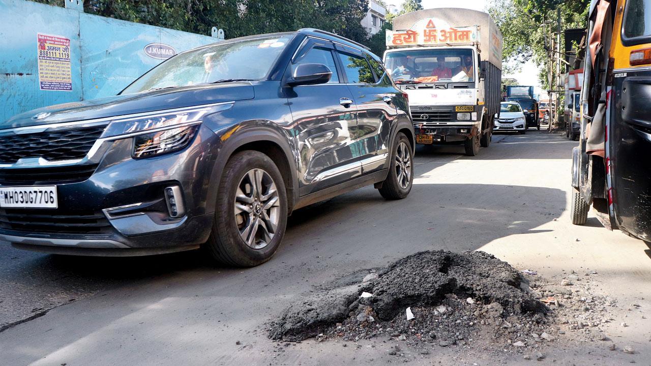 A pile of silt kept in the middle of a road in Santacruz