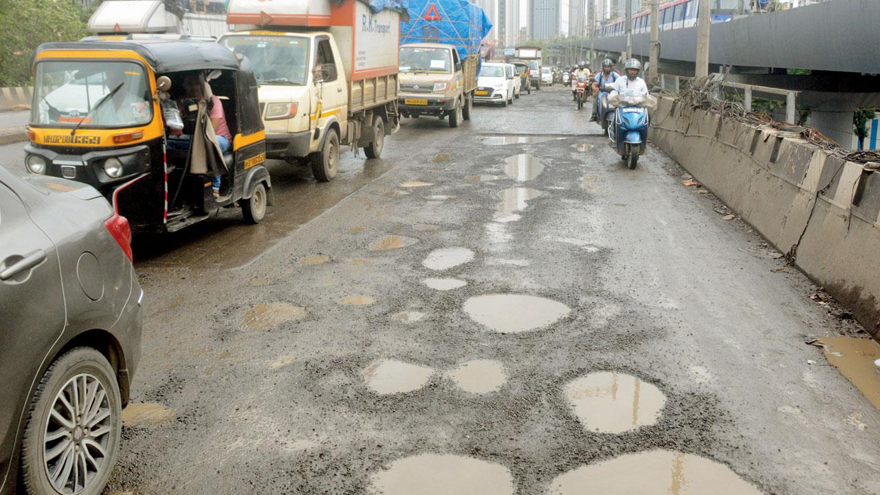 SGNP flyover riddled with potholes, on Western Express Highway, in Borivli on August 13. PIC/SATEJ SHINDE