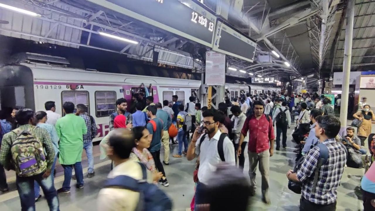 People waiting at station on Friday evening. Pic/ Sameer Markande