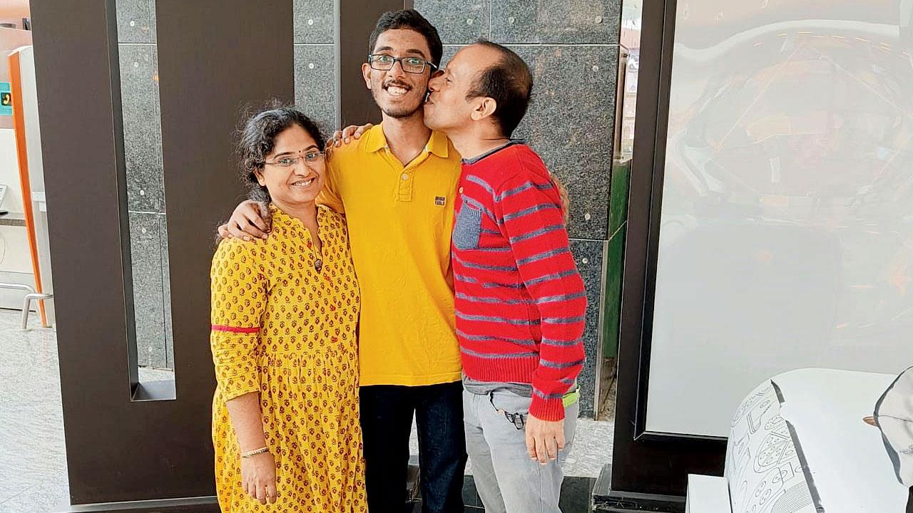 R K Shishir, the all-India topper, with his parents in their Bengaluru home