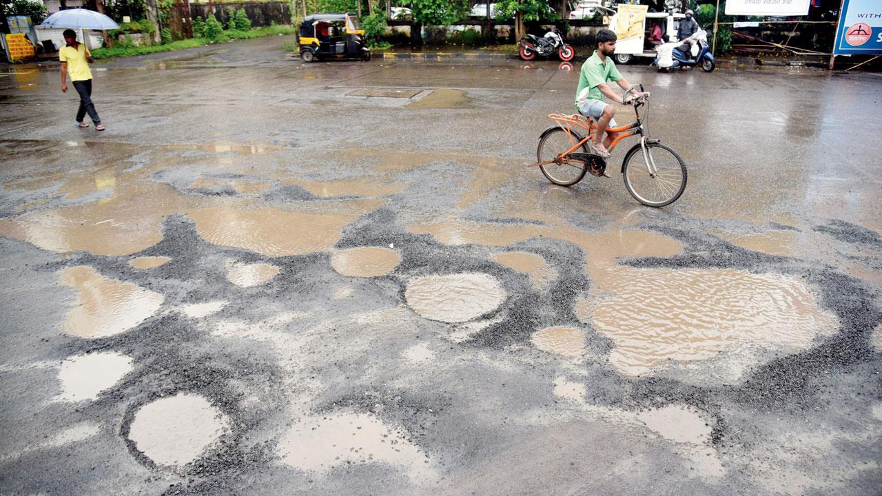 Huge potholes dot the road in Bandra. Pic/Sameer Markande
