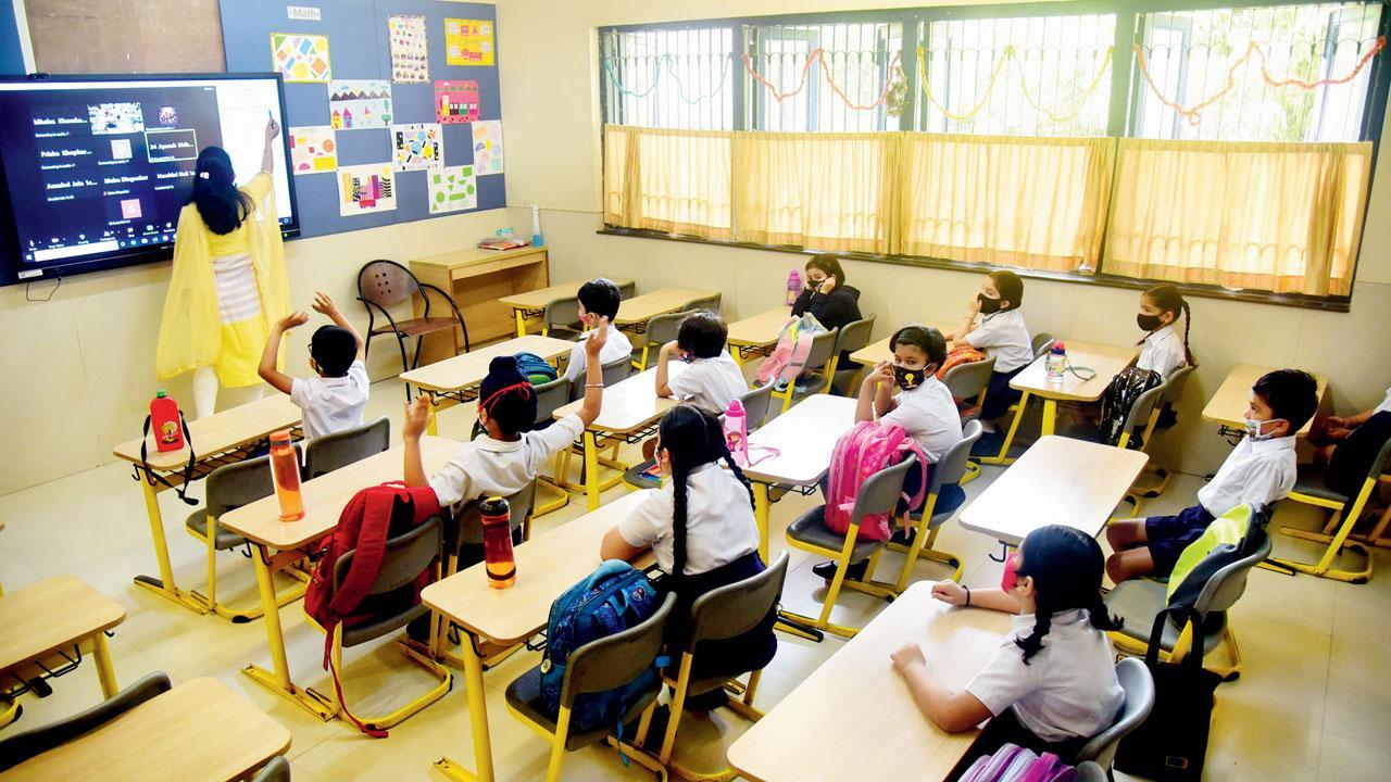 Students attend a class at Jasudben ML School, Santacruz. File pic