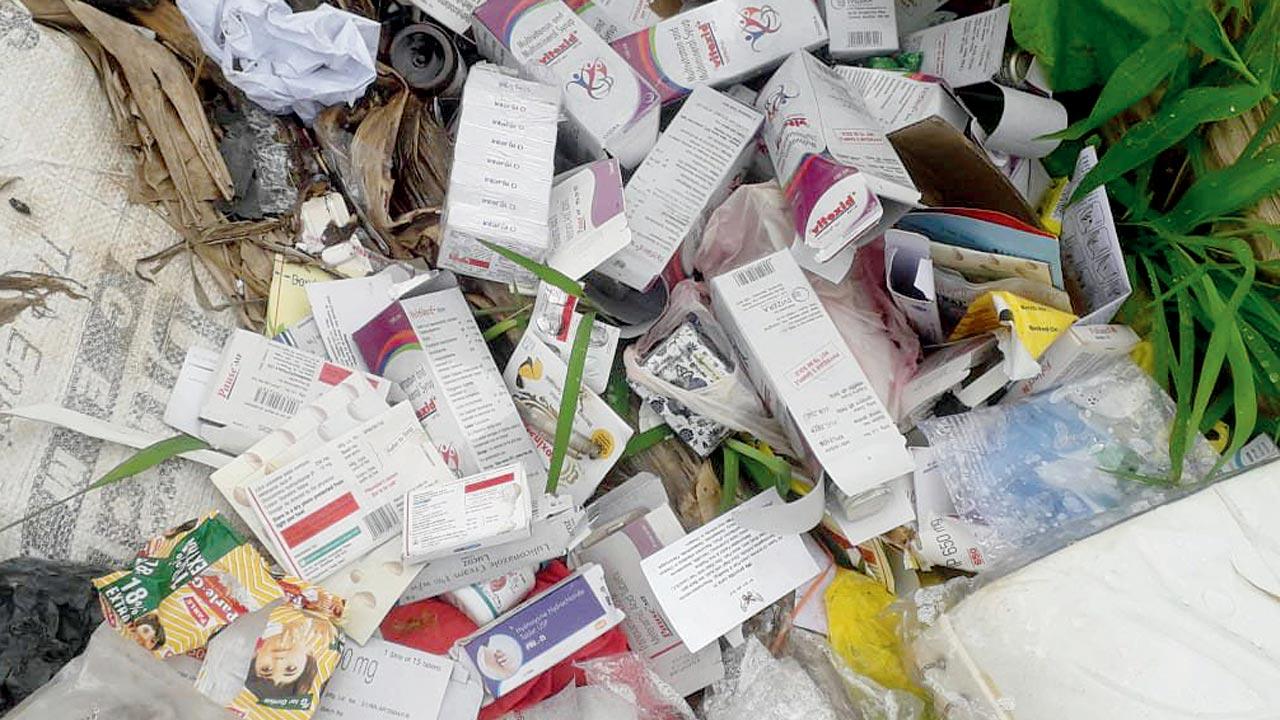 Medical waste, discarded school bags found at a mangrove site