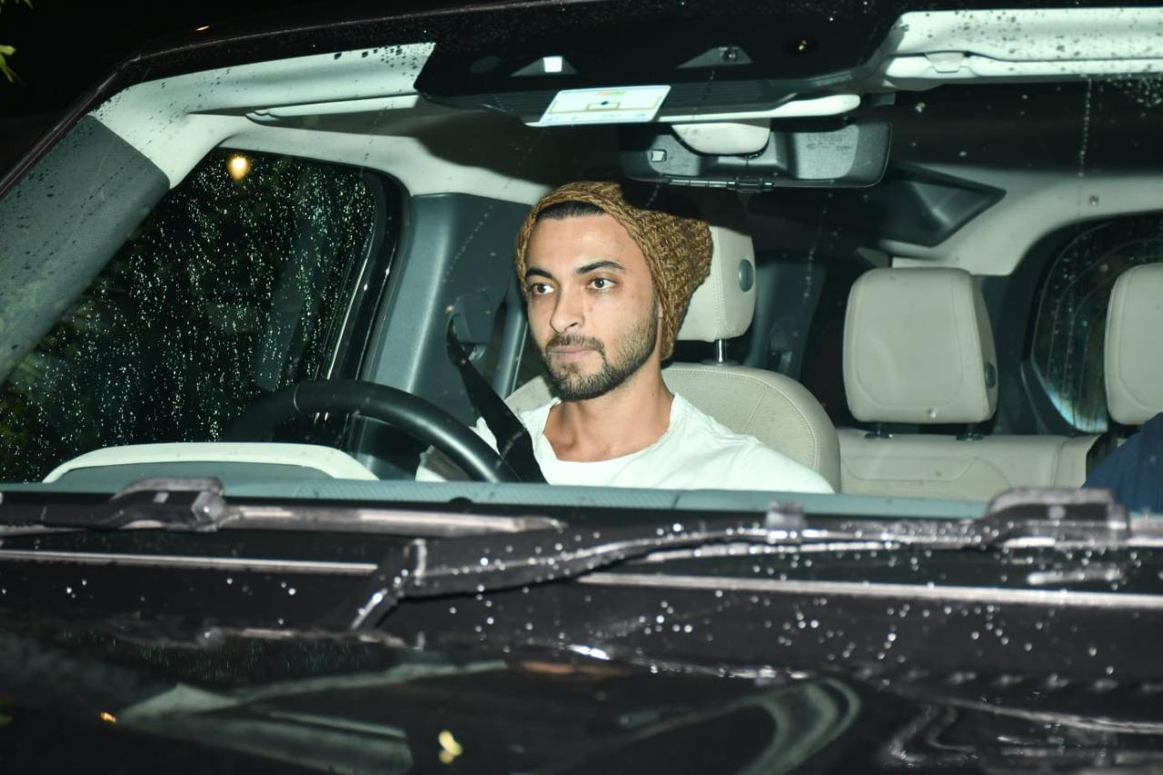 Aayush Sharma was seen driving himself to the party. The actor maintained a casual look with a white T-shirt and a beanie 