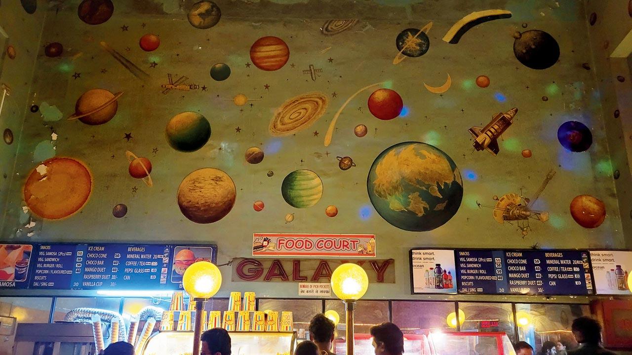 The stars hover above the audience at the popcorn counters at Bandra’s G-7