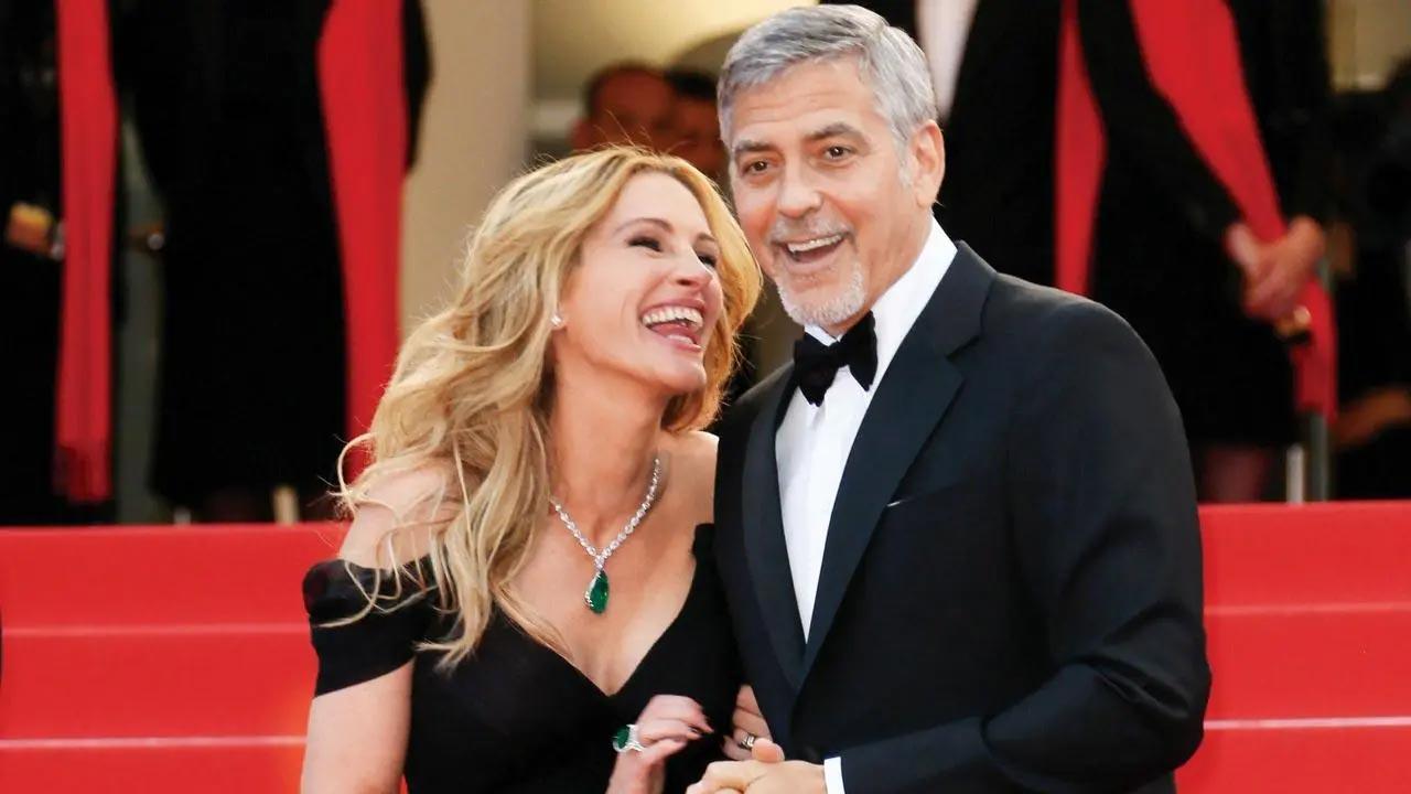 Julia Roberts, George Clooney joke filming kissing scene for 'Ticket to Paradise' took 'six months' and '80 takes'