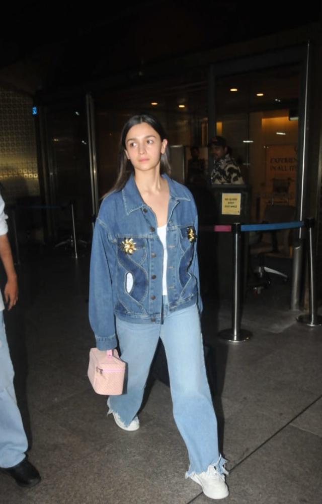 Alia Bhatt styles her laid-back airport look with Dust of Gods customised denim  jacket | PINKVILLA