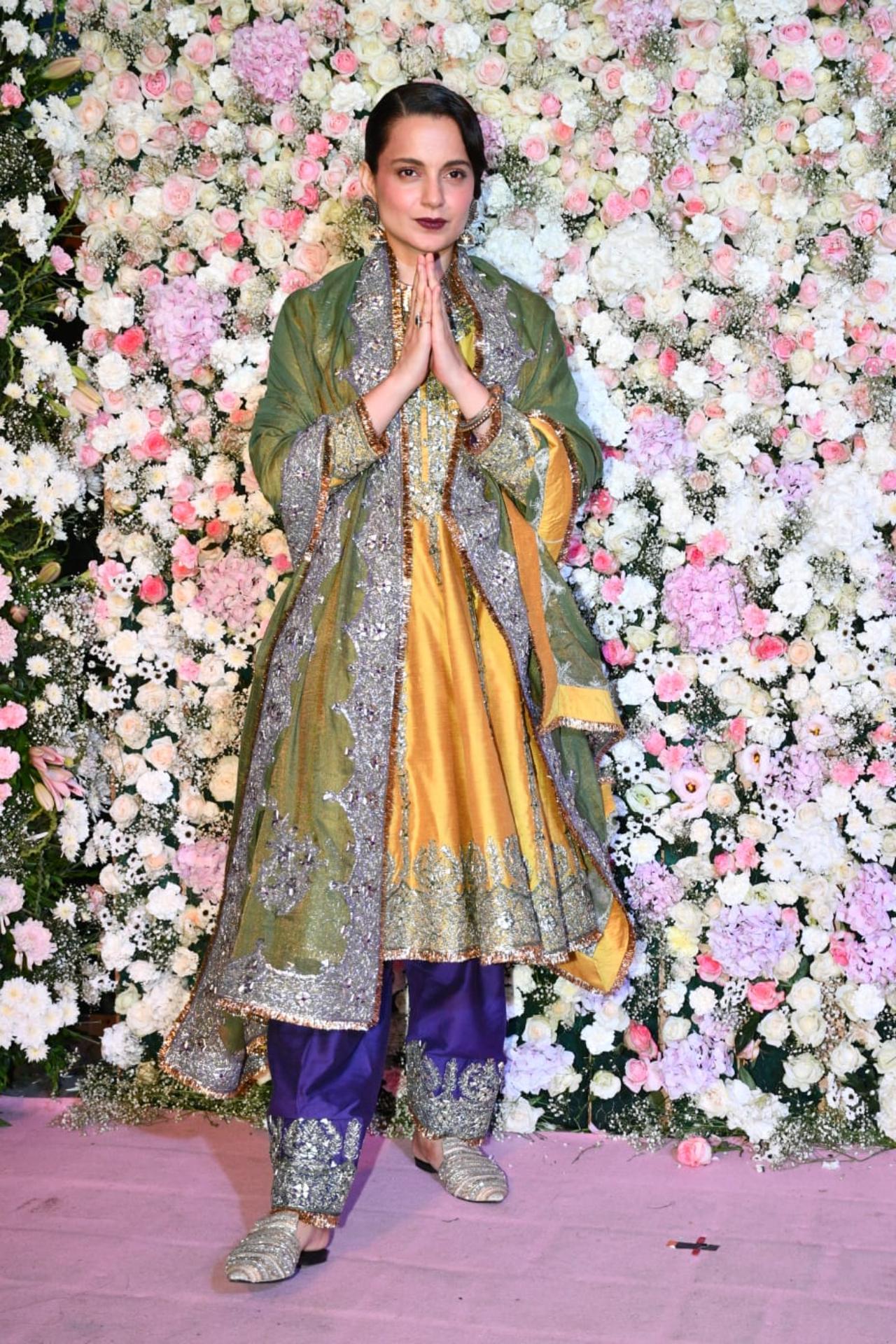 Kangana Ranaut opted for a yellow and violet traditional wear for the party