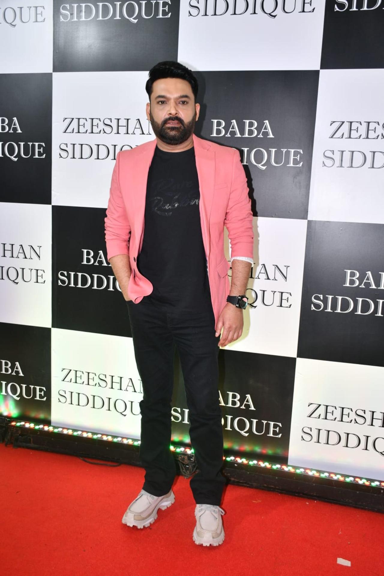 Kapil Sharma opted for a pink blazer over a black T-shirt and black pants for the night