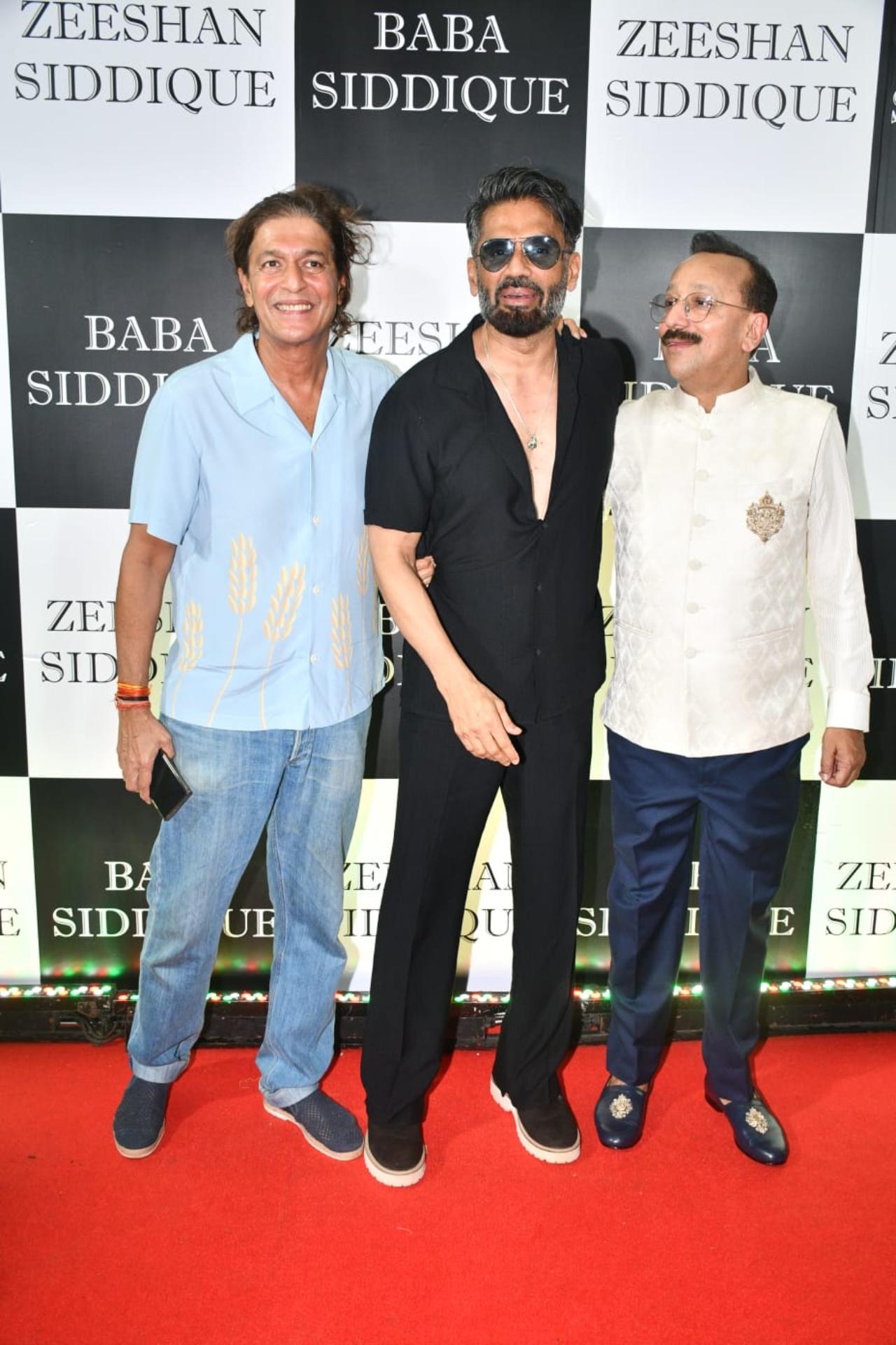 Suniel Shetty came dressed in an all-black outfit while Chunky looked cool in a blue outfit. The duo posed with host Baba Siddique