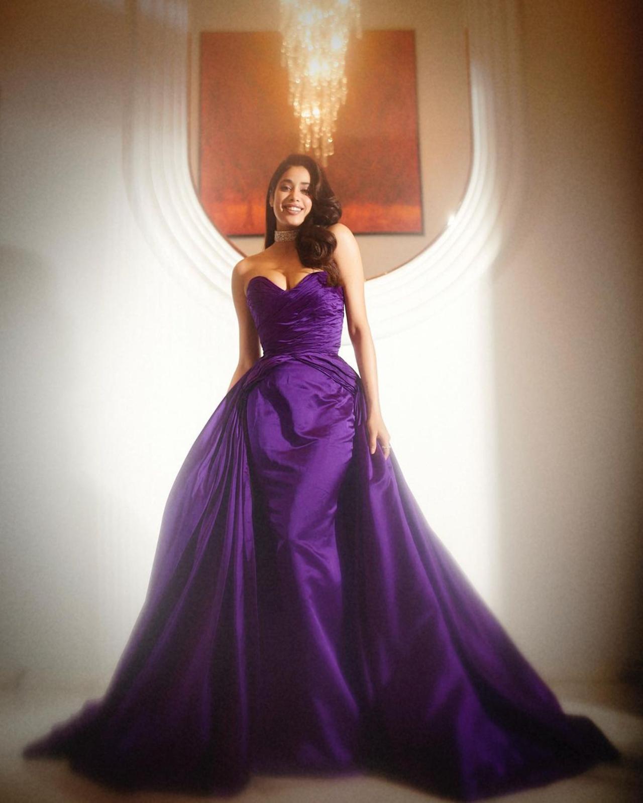 Stepping away from black, Janhvi Kapoor stood out in this purple gown and radiated with her dewy make up and diamond choker