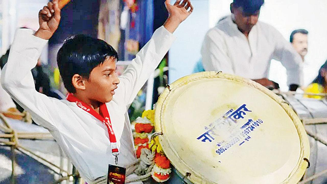 Relatives of Veer Mandavkar, 9, outside his parent’s home in BMC Colony in Goregaon East. Veer, a Class II student at Lakshya Dham School, had joined the band three months ago. Pics/Shadab Khan