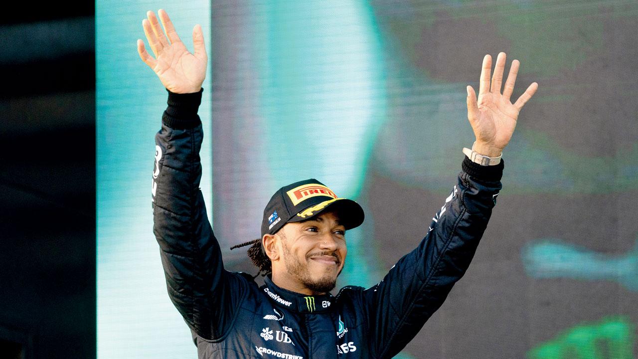 The British driver waves to the crowd after finishing second. Pics/AFP, Getty Images
