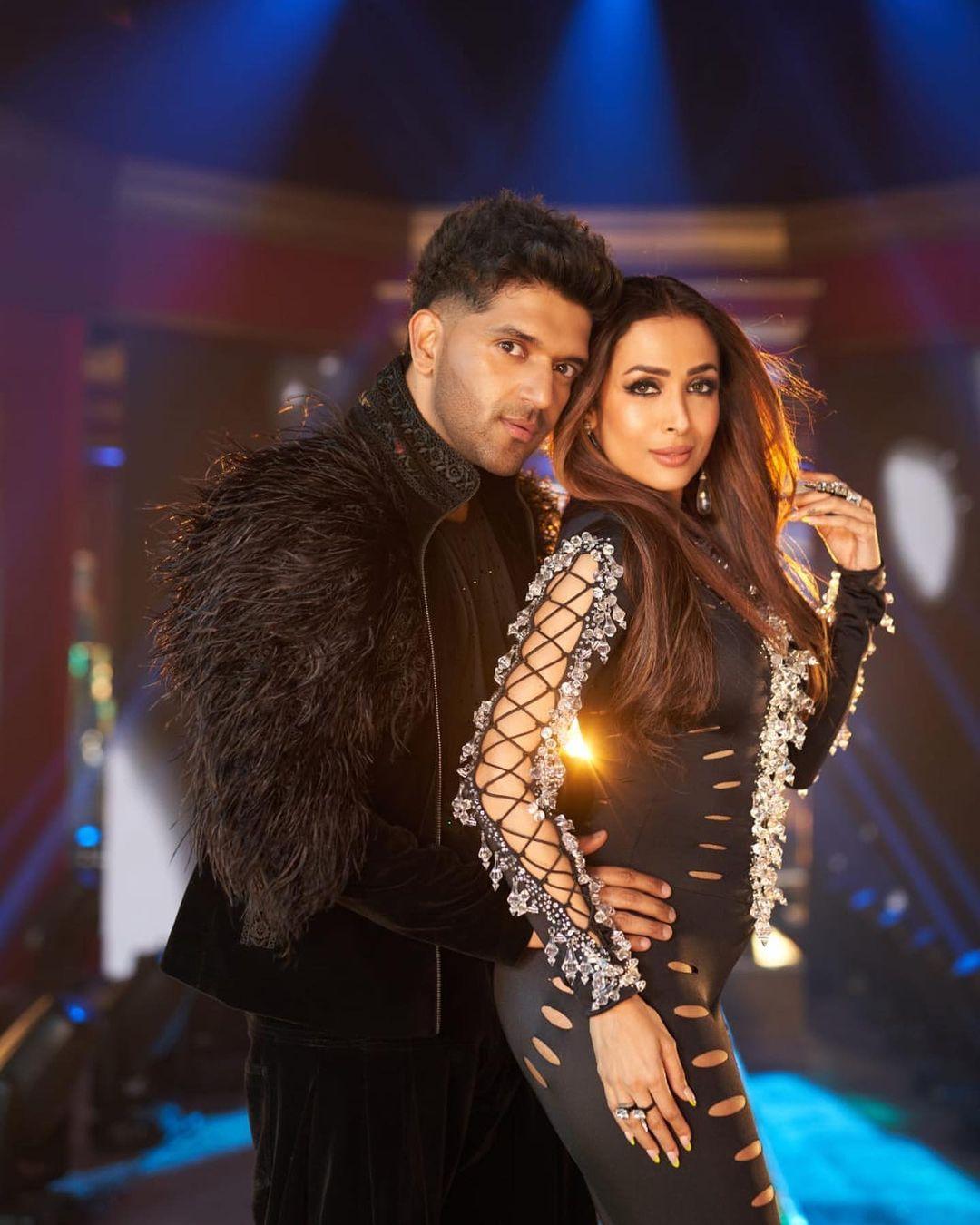 In one of the pics, Malaika looked stunning in a white frilly outfit that complemented her curves. In another picture, she is seen in a black bodysuit In one of the pics, Malaika looked stunning in a white frilly outfit that complemented her curves. In another picture, she is seen in a black bodysuit
