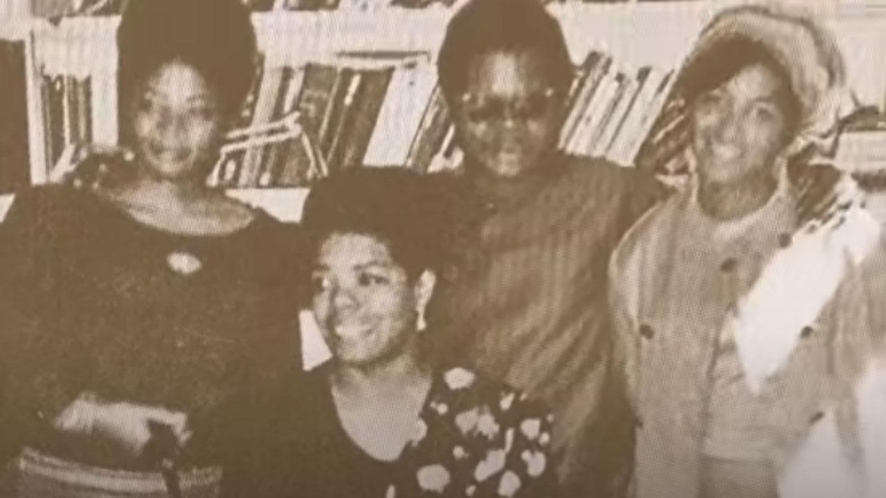 Angelou (centre) at a meeting. Pic Courtesy/Youtube