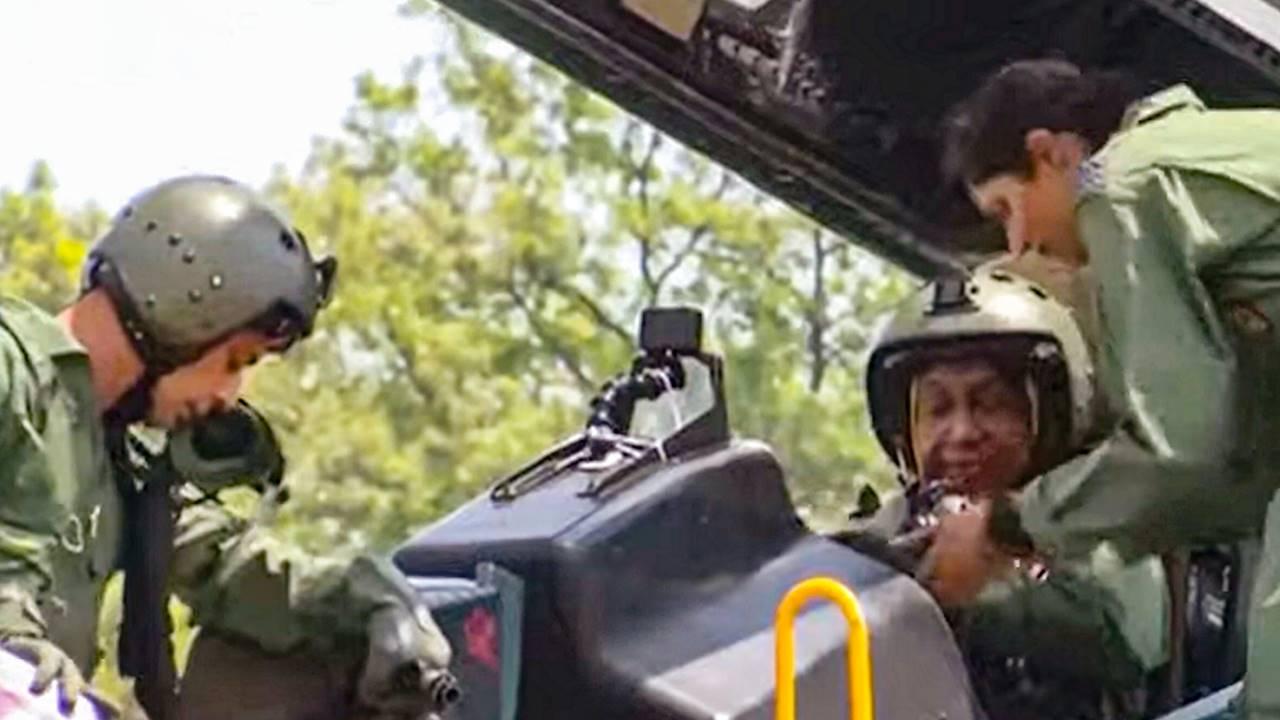 After sitting in the cockpit, a woman officer helped her put on the helmet and complete other technicalities. She waved from the cockpit just seconds before the aircraft canopy was shut.