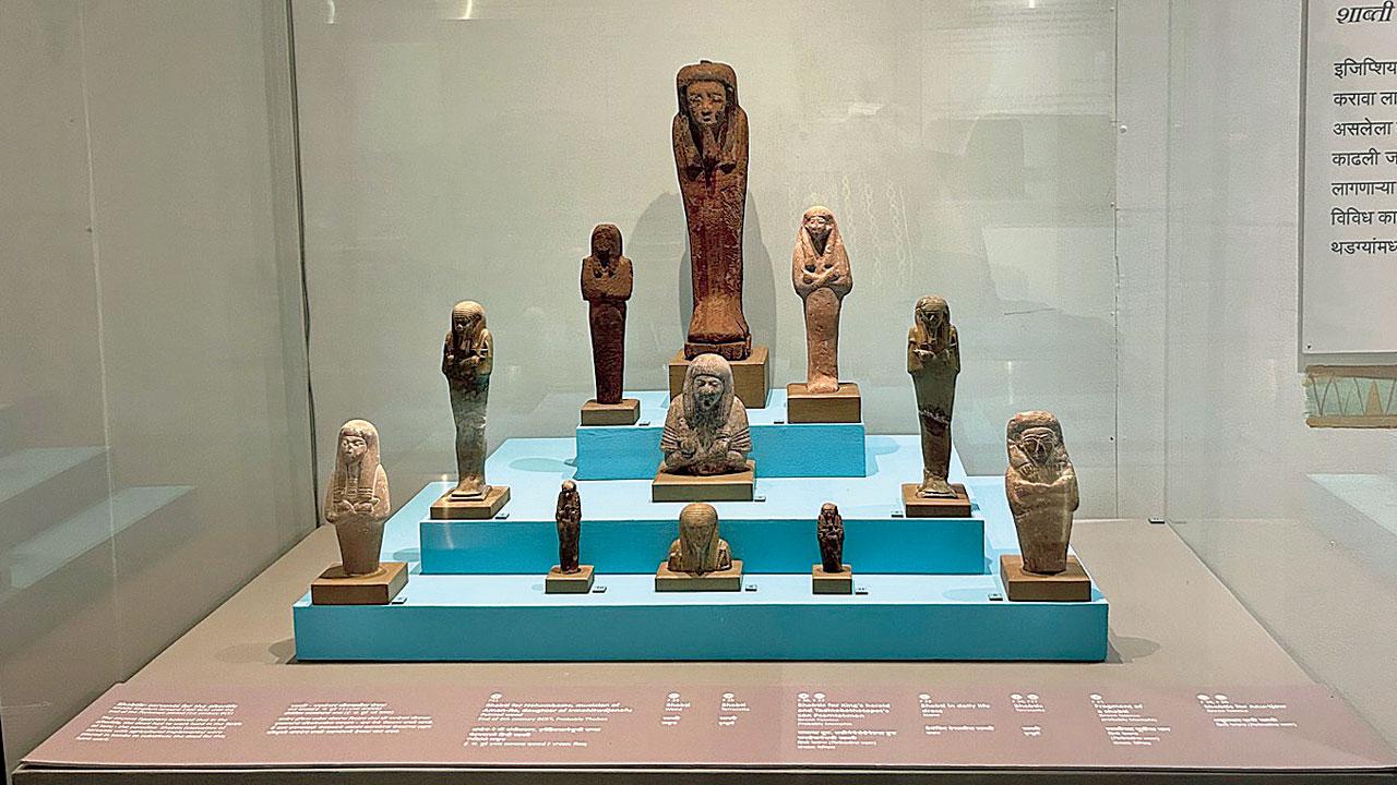 Shabtis, small figurines of servants kept as part of the display