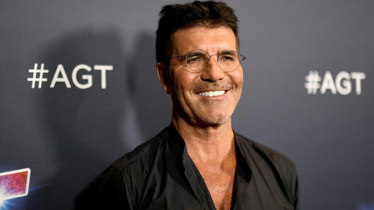 Simon Cowell quits smoking after puffing on 40 cigarettes a day