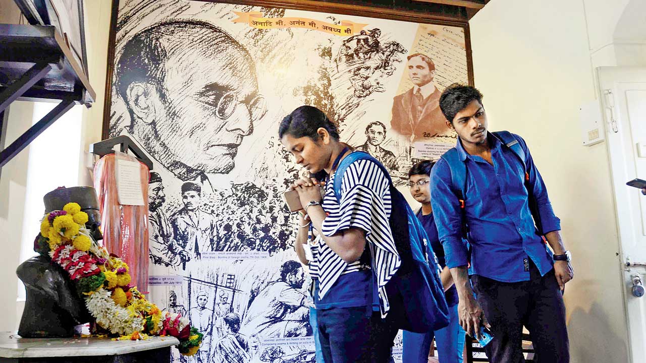 Visitors pay tribute to Veer Savarkar at his room in Fergusson College, Pune, on his death anniversary in 2019. Writer-journalist Vaibhav Purandhare says he continues to be part of the cultural and social consciousness of Maharashtra, because of his poetry, songs and contribution to Marathi literature. Pics/Getty Images