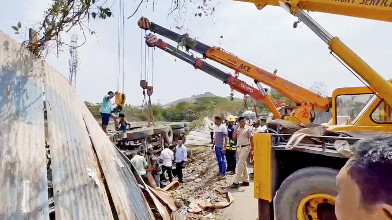 The authorities attempt to shift the dumper away from the mishap site