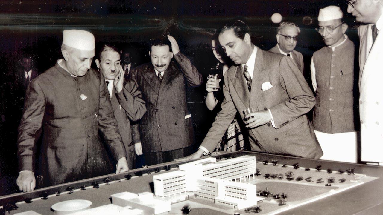 Bhabha shows Nehru a model of the new TIFR buildings as SS Bhatnagar, Morarji Desai and JD Choksi look on. A wall in the entrance hall was 45 ft long and nine feet high, and Bhabha was keen that it carry a Pablo Picasso mural 