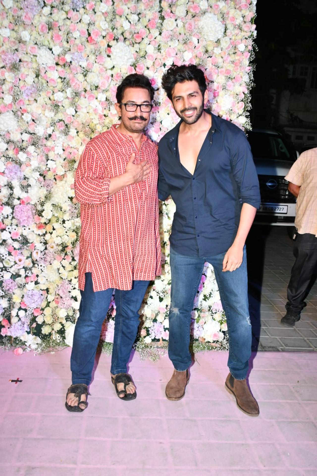 At Aayush Sharma and Arpita Khan's Eid party on Saturday night, Aamir Khan and Kartik Aaryan bumped into each other. The duo who belong to different generation of actors were seen chatting and hugging each other outside the venue. Earlier, Kartik and Aamir had attended a wedding where they were seen dancing together. See more pics from the big Eid party here